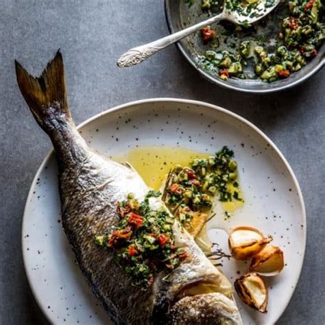 Baked Whole Fish with Lemon Herb Garlic Butter.